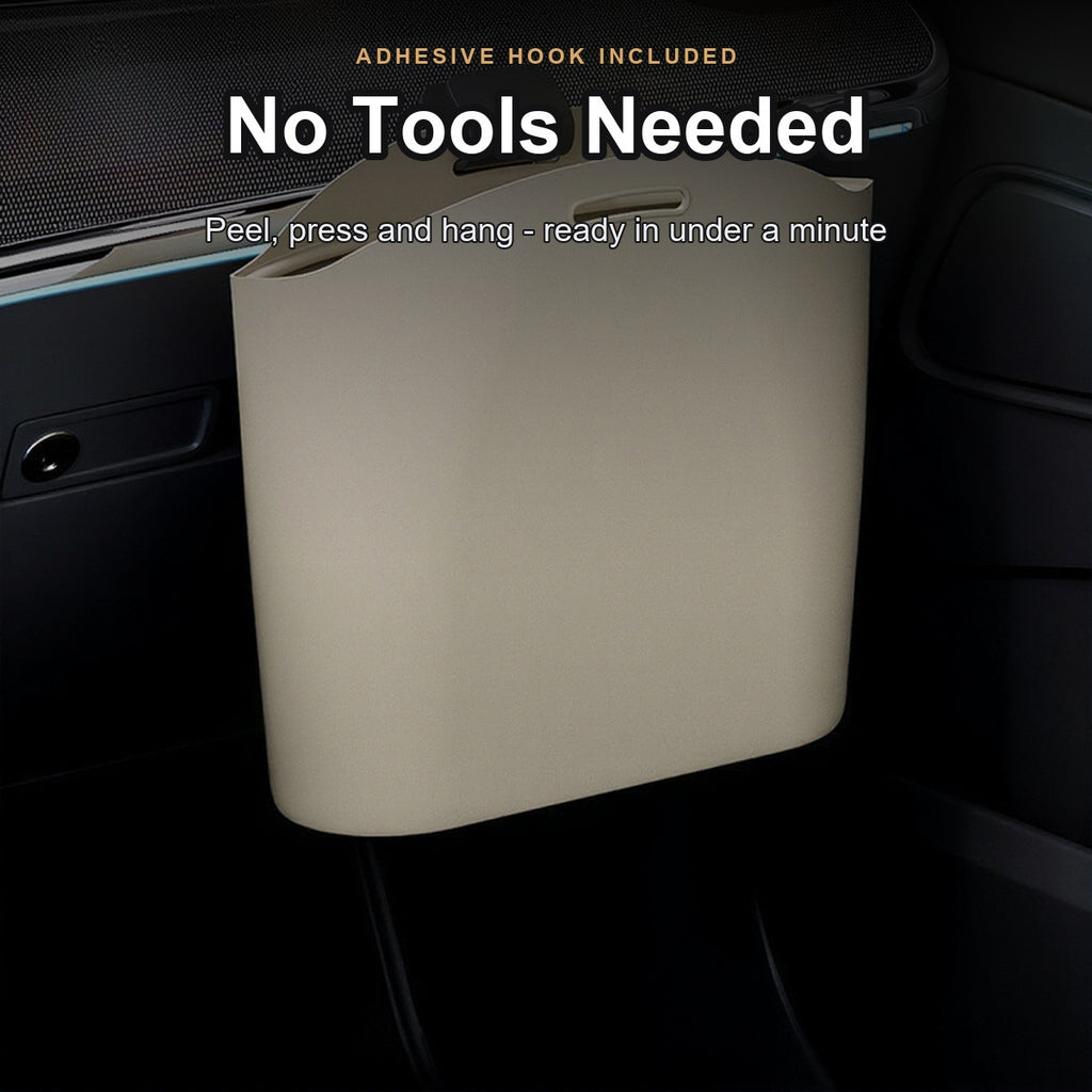 Trash bag clipped onto the lower dashboard with the adhesive hook