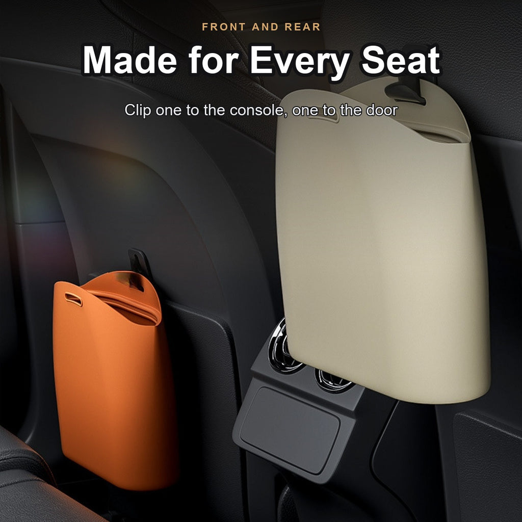 Two trash bags mounted on the console and the door panel